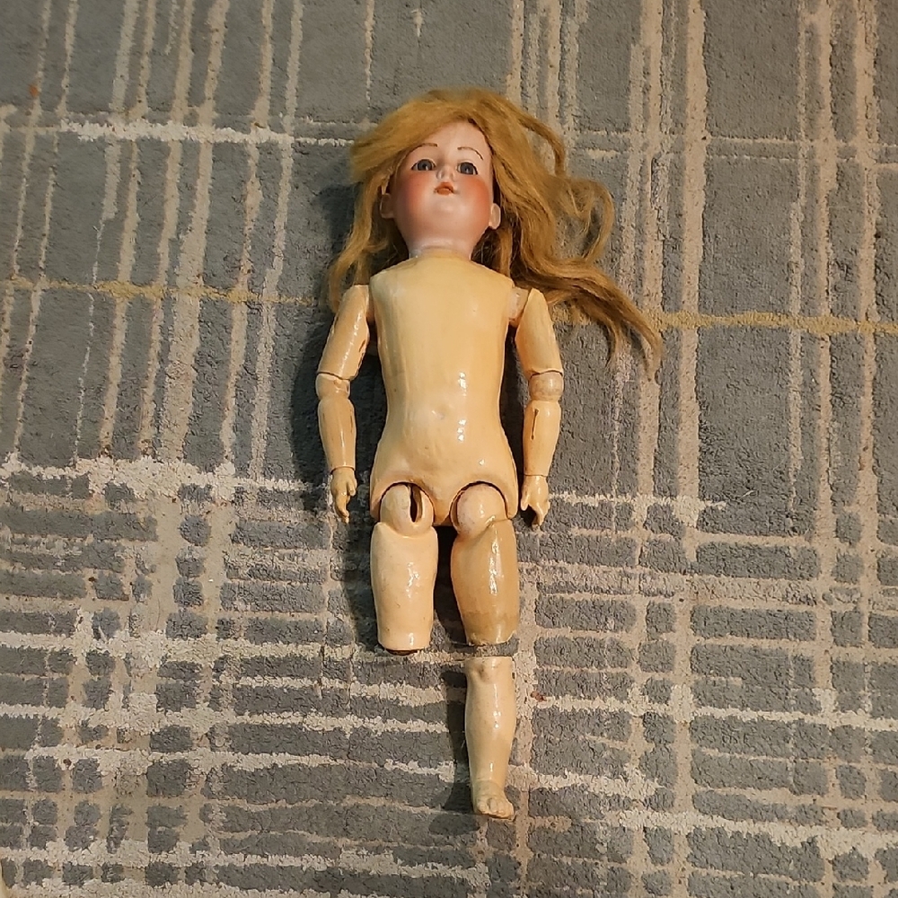 Vintage Porcelain Head Doll with Articulated Limbs